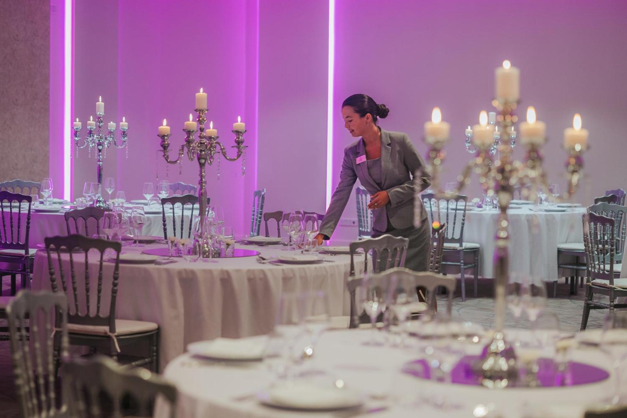 Royal Apollonia By Louis Hotels Limassol Exterior photo A hotel staff member sets up a table for a wedding reception