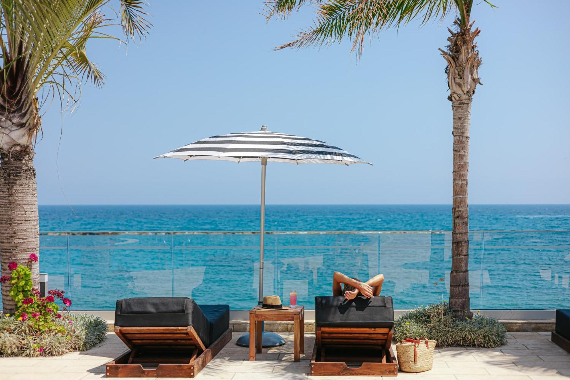 Royal Apollonia By Louis Hotels Limassol Exterior photo The beach at the Four Seasons Hotel