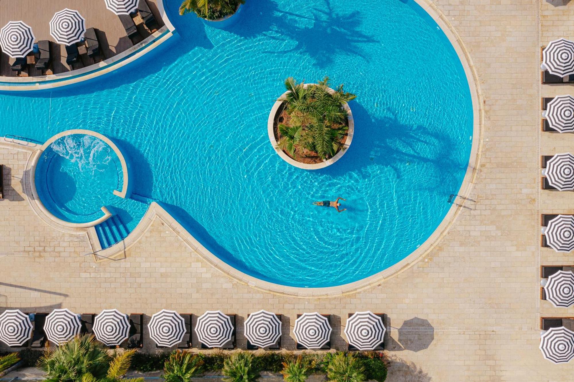 Royal Apollonia By Louis Hotels Limassol Exterior photo Aerial view of a swimming pool