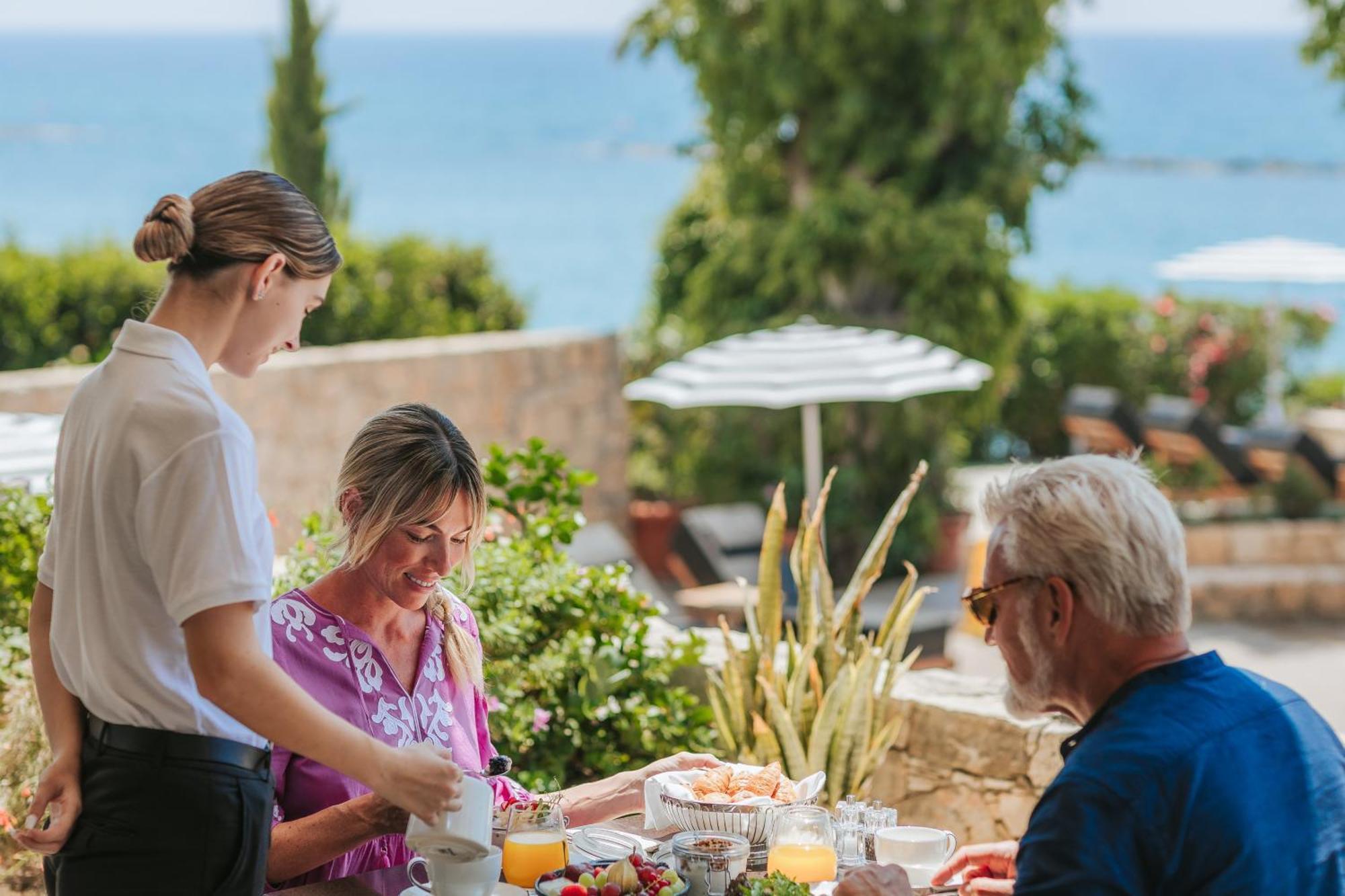 Royal Apollonia By Louis Hotels Limassol Exterior photo A hotel butler serving guests