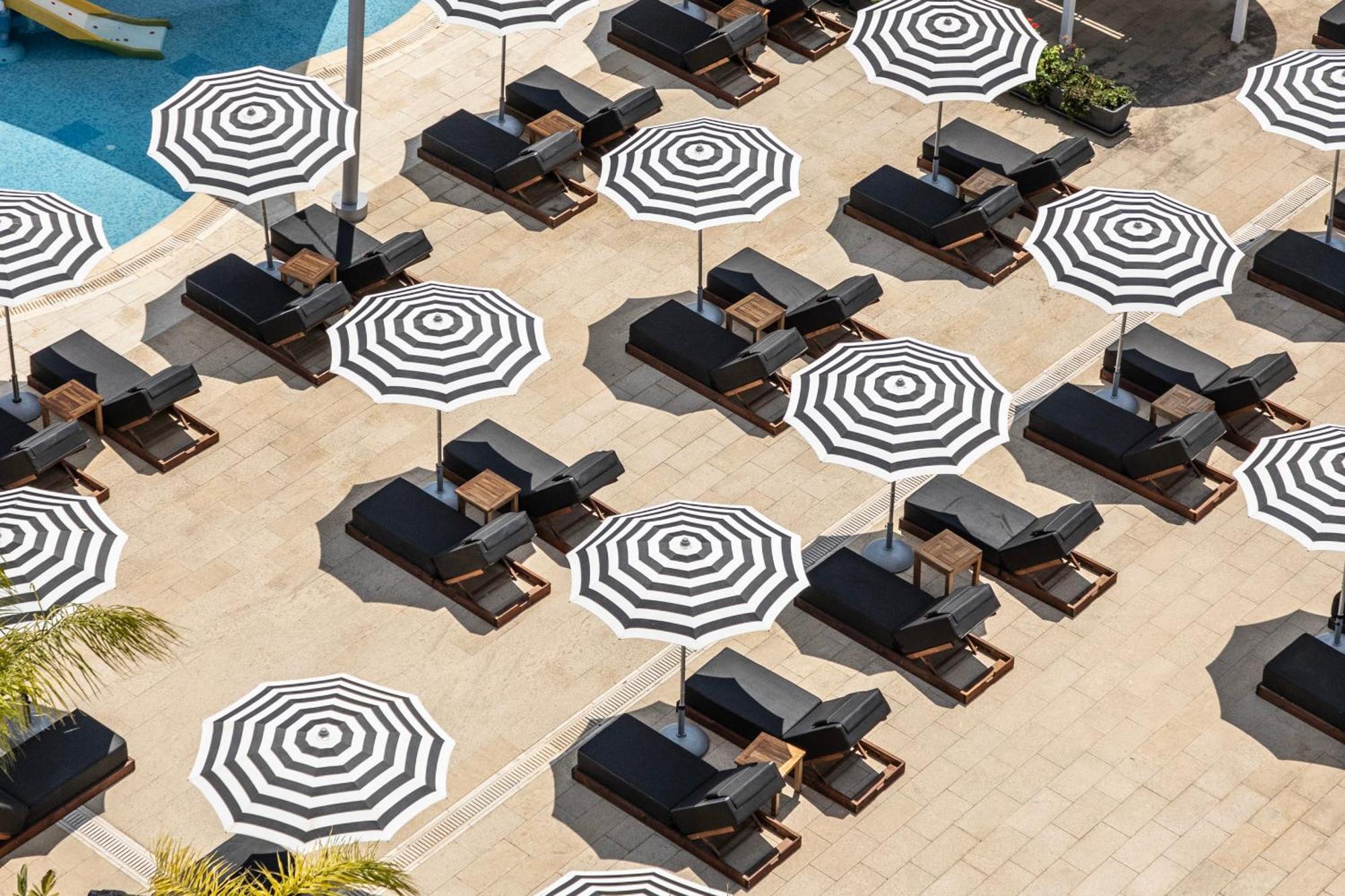 Royal Apollonia By Louis Hotels Limassol Exterior photo The pool deck at the W South Beach